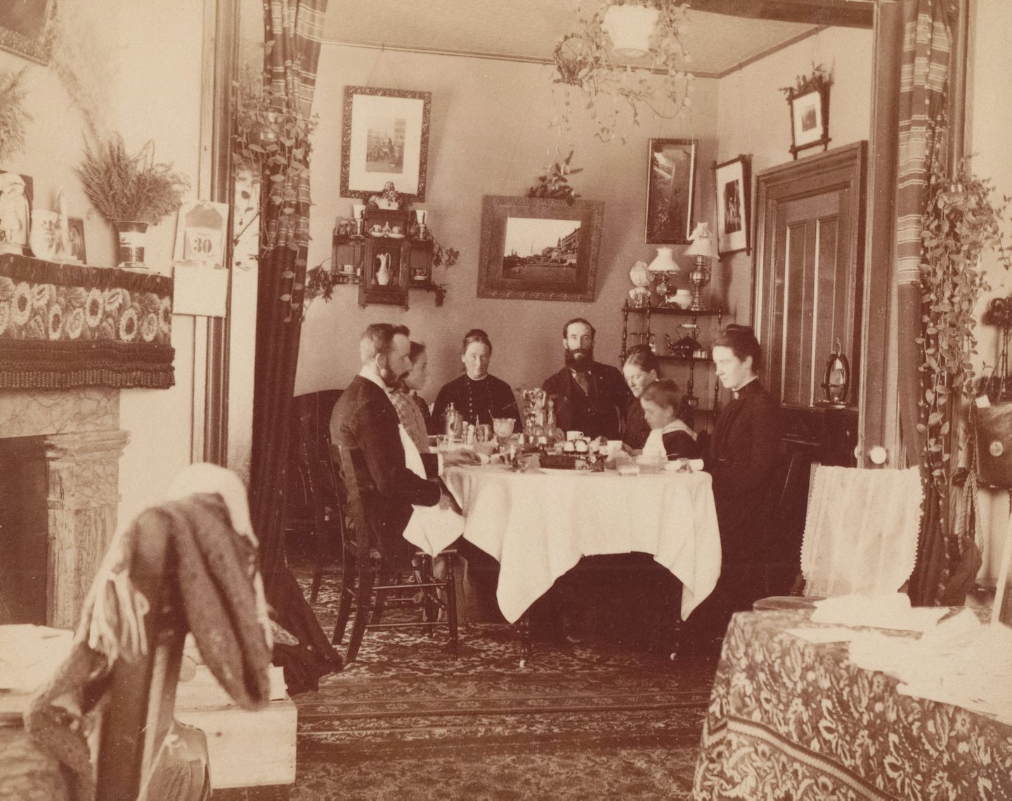 Family sitting together at a table for a meal.
